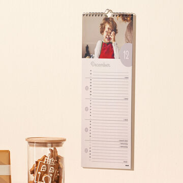 A stylish wall calendar with a beautiful photo and generous layout. It evokes memories of special moments and plans your favorite moments for December.