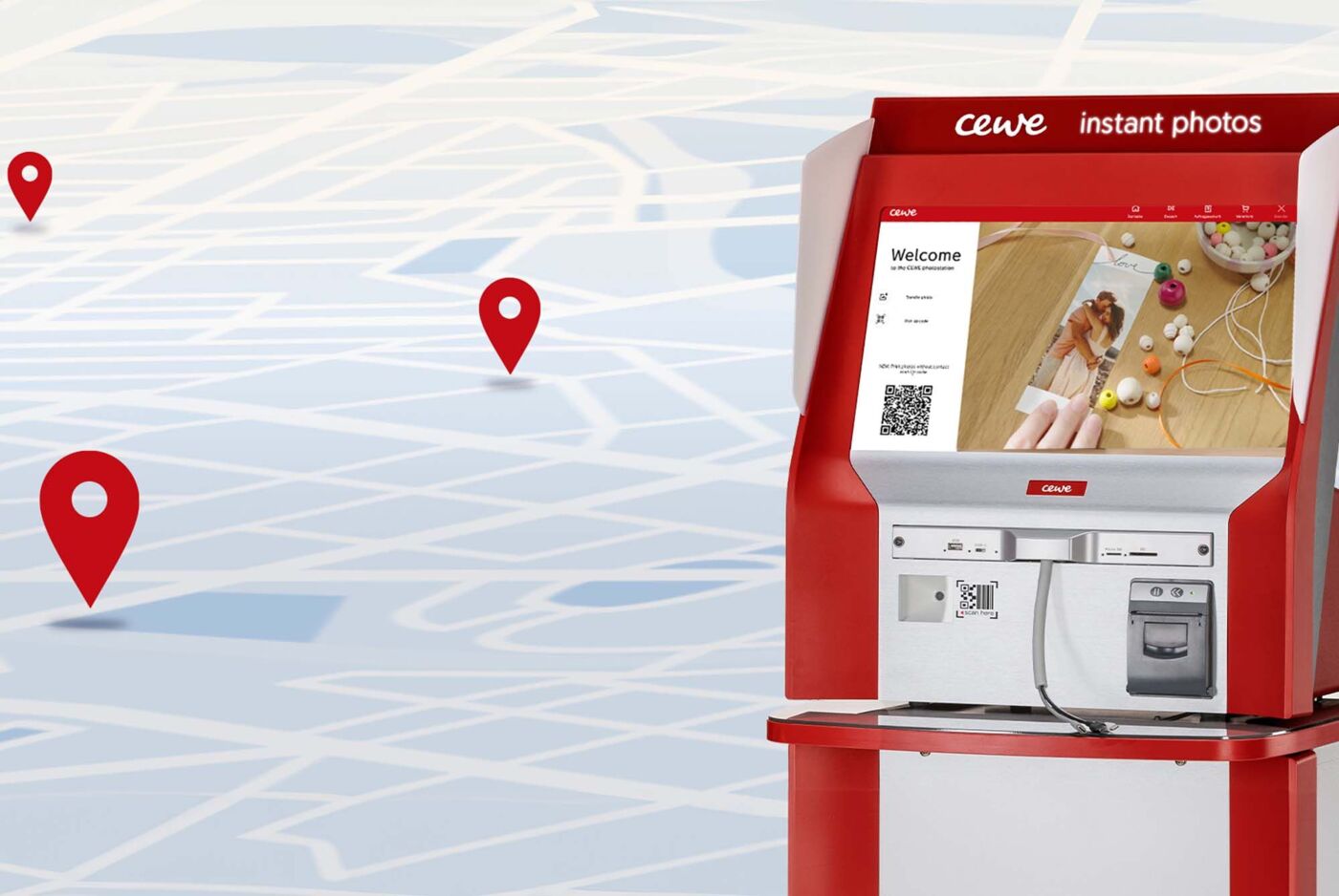 CEWE instant photo kiosk with a screen and colorful pictures.